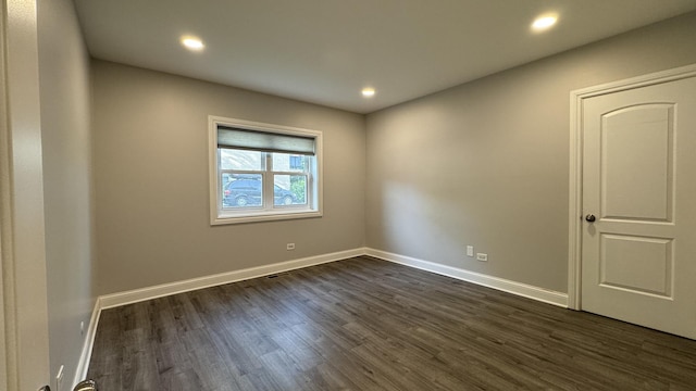 8210 Elmwood Ave Unit 106, Skokie, IL 60077 - empty room with dark wood finished floors, recessed lighting, and baseboards
