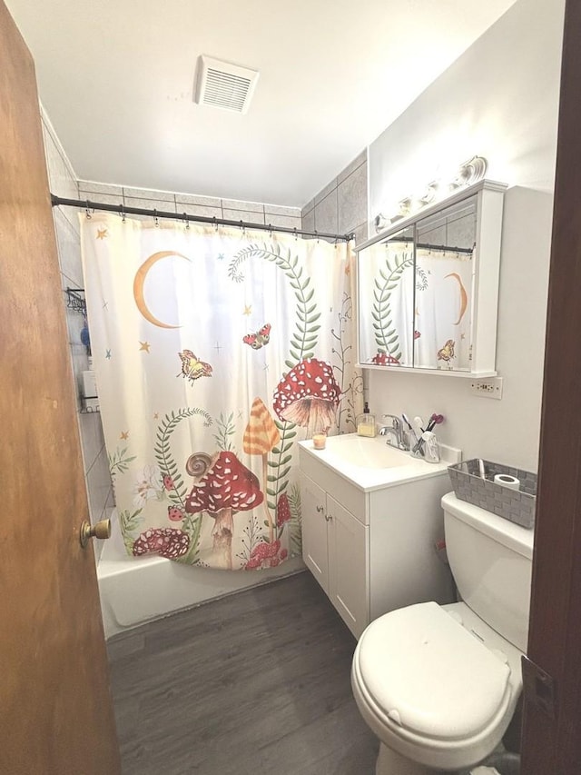 7951 S Kolin Ave, Chicago, IL 60652 - bathroom with vanity, wood finished floors, toilet, and shower / bath combination with curtain