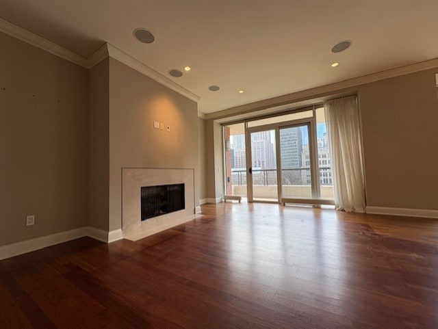 270 E Pearson St Unit 602, Chicago, IL 60611 - unfurnished living room with crown molding, wood finished floors, baseboards, a high end fireplace, and recessed lighting