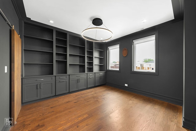 1448 W Chestnut St Unit 3, Chicago, IL 60642 - unfurnished room with crown molding, wood finished floors, and recessed lighting