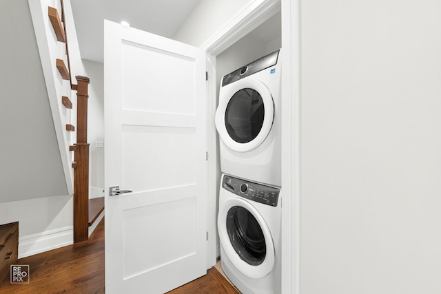 1448 W Chestnut St Unit 3, Chicago, IL 60642 - laundry room featuring stacked washer and clothes dryer and dark wood-style floors