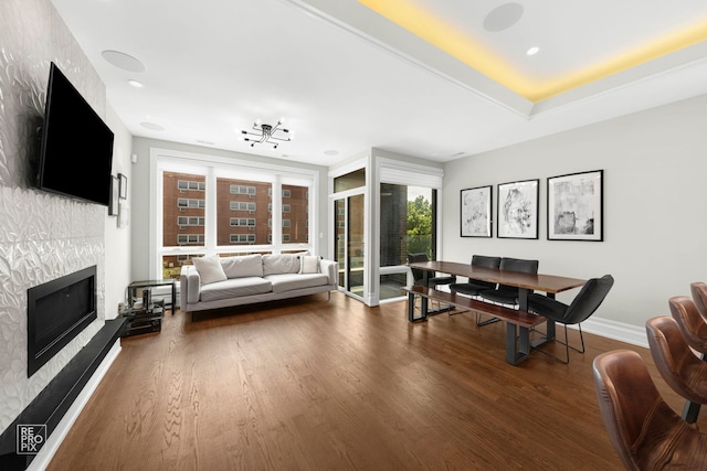 1448 W Chestnut St Unit 3, Chicago, IL 60642 - living area featuring wood finished floors, a fireplace, baseboards, and recessed lighting