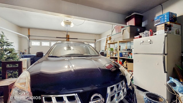 1719 Westbridge Ct, Hoffman Estates, IL 60194 - garage with freestanding refrigerator and a garage door opener