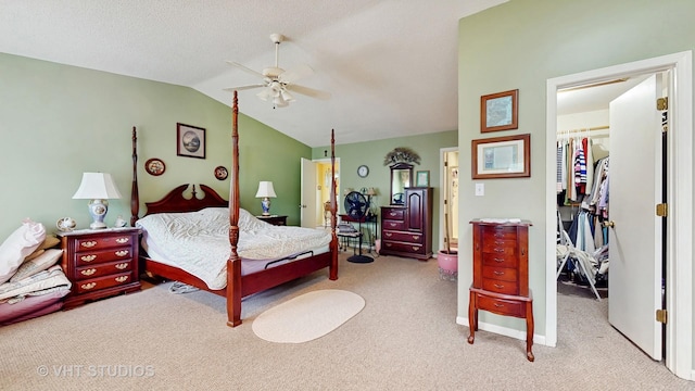 1719 Westbridge Ct, Hoffman Estates, IL 60194 - carpeted bedroom with lofted ceiling, a walk in closet, ceiling fan, and a closet