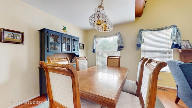 1719 Westbridge Ct, Hoffman Estates, IL 60194 - dining area featuring wood finished floors and baseboards