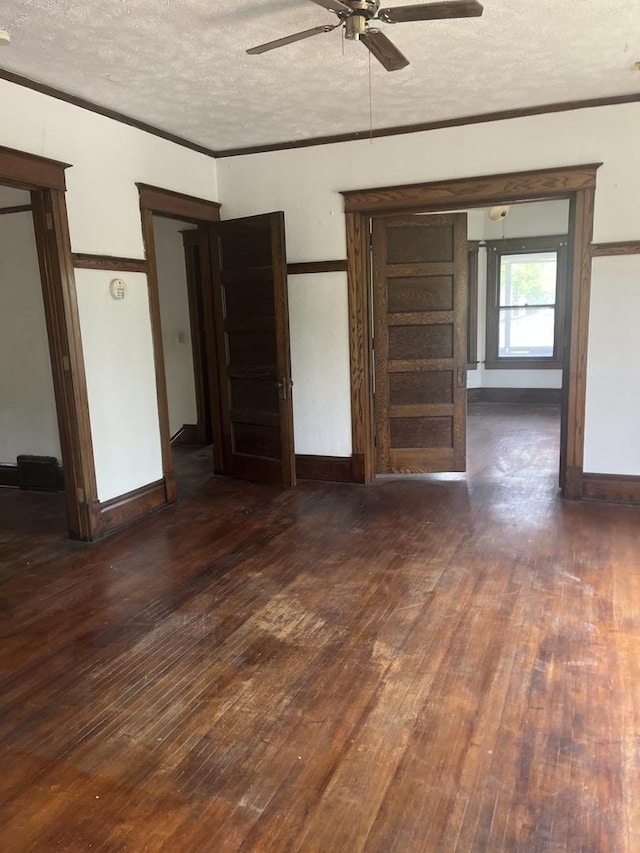 1825 S 6th St, Rockford, IL 61104 - spare room with a textured ceiling, a ceiling fan, wood-type flooring, crown molding, and baseboards