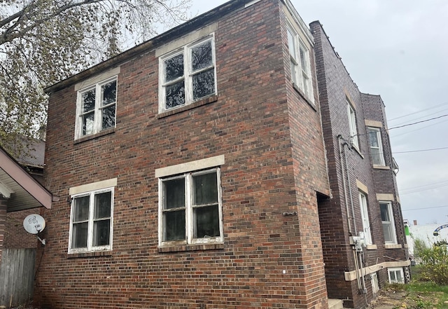 1825 S 6th St, Rockford, IL 61104 - view of home's exterior featuring brick siding