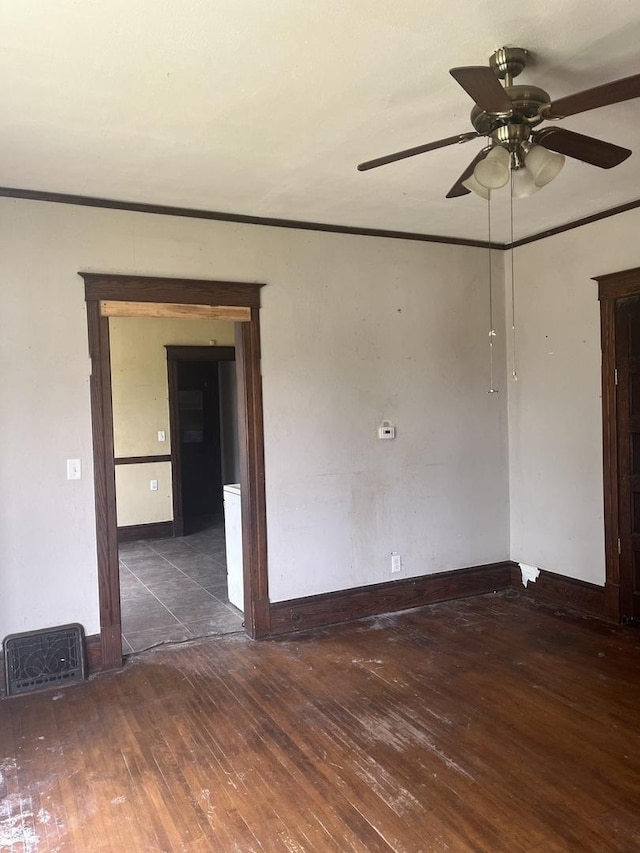 1825 S 6th St, Rockford, IL 61104 - empty room with wood-type flooring, crown molding, baseboards, and a ceiling fan
