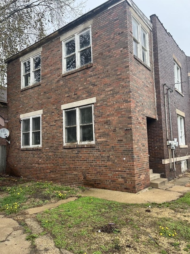 1825 S 6th St, Rockford, IL 61104 - view of property exterior with brick siding