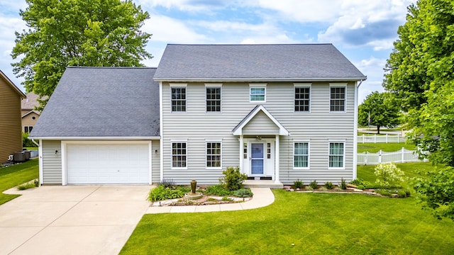 631 Prairie View Ln, Hinckley, IL 60520 - colonial-style house featuring driveway, central AC, and a shingled roof