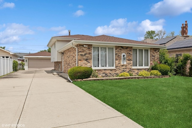 5738 W 88th St, Oak Lawn, IL 60453 - view of front of house with brick siding, a garage, an outbuilding, and a shingled roof