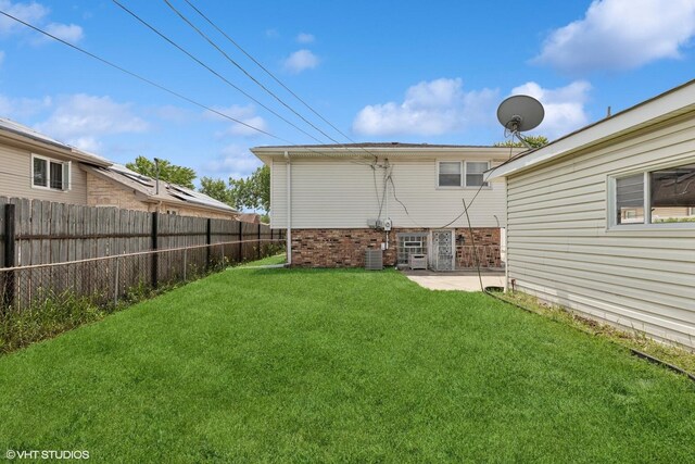 5738 W 88th St, Oak Lawn, IL 60453 - view of yard with central AC unit and a patio