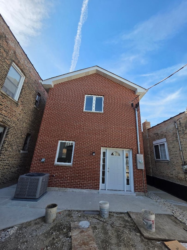 2906 W 40th St, Chicago, IL 60632 - back of property featuring brick siding and central AC unit