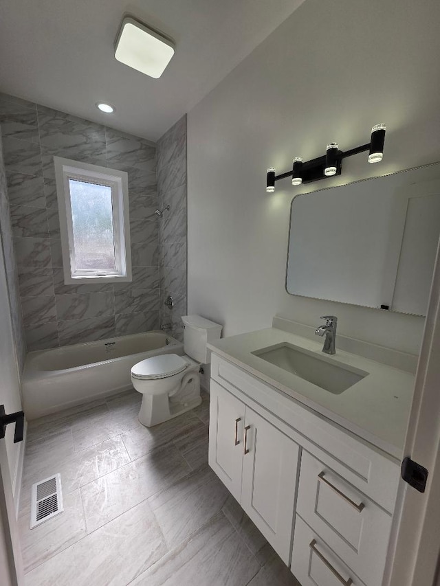 2906 W 40th St, Chicago, IL 60632 - bathroom featuring vanity, toilet, shower / bathtub combination, and tile patterned flooring