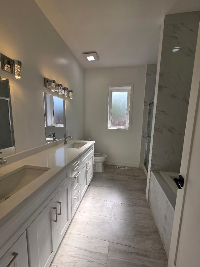 2906 W 40th St, Chicago, IL 60632 - full bath featuring double vanity, a marble finish shower, toilet, and a tub with marble appearance