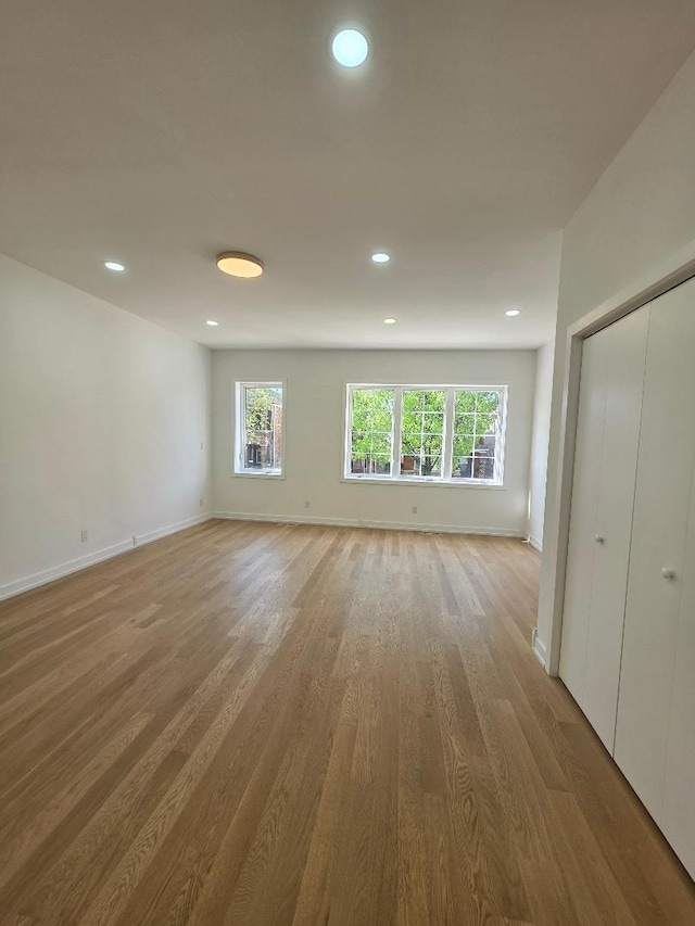 2906 W 40th St, Chicago, IL 60632 - spare room featuring light wood-type flooring, plenty of natural light, baseboards, and recessed lighting