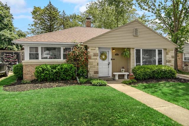 17601 Howe Ave, Homewood, IL 60430 - bungalow with a front lawn, a chimney, and roof with shingles