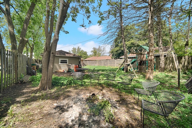 17601 Howe Ave, Homewood, IL 60430 - fenced backyard with a playground