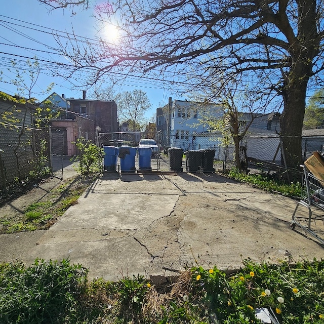 212 N Leamington Ave, Chicago, IL 60644 - view of patio / terrace featuring a gate