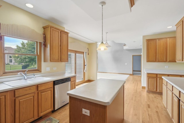 548 Asbury Dr, Aurora, IL 60502 - kitchen featuring dishwasher, a sink, a kitchen island, light wood-style floors, and light countertops
