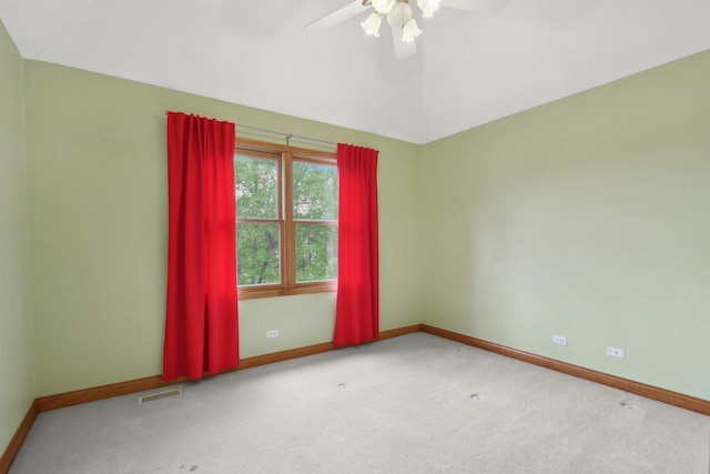 548 Asbury Dr, Aurora, IL 60502 - empty room featuring baseboards, carpet, a ceiling fan, and vaulted ceiling