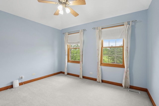 548 Asbury Dr, Aurora, IL 60502 - carpeted empty room featuring baseboards and ceiling fan