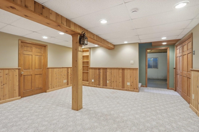 548 Asbury Dr, Aurora, IL 60502 - finished below grade area featuring wainscoting, carpet floors, wood walls, a drop ceiling, and recessed lighting