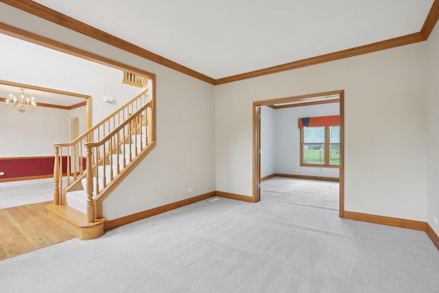548 Asbury Dr, Aurora, IL 60502 - unfurnished room featuring carpet, baseboards, ornamental molding, a chandelier, and stairway