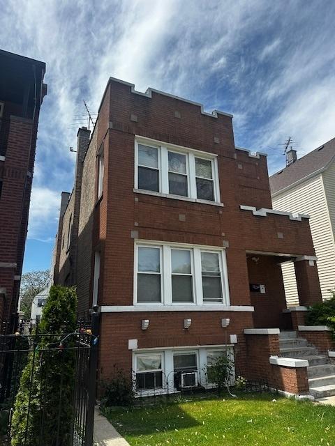 2428 N Lorel Ave, Chicago, IL 60639 - view of front facade with brick siding