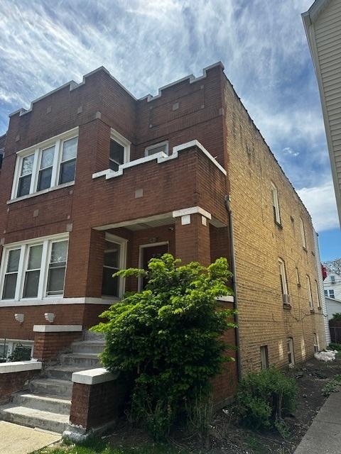 2428 N Lorel Ave, Chicago, IL 60639 - view of property exterior with brick siding