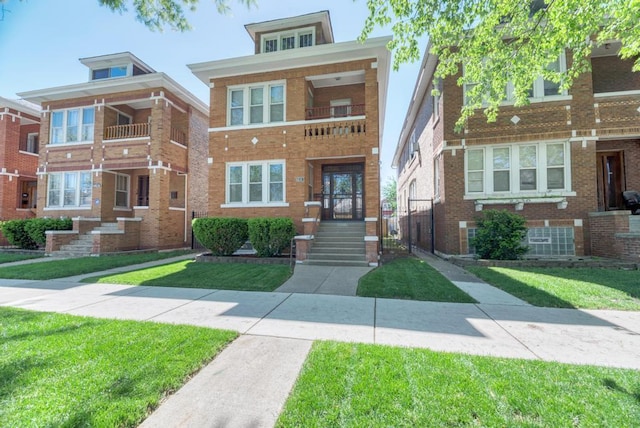 6834 S Rockwell St, Chicago, IL 60629 - view of front of home featuring brick siding and a front yard