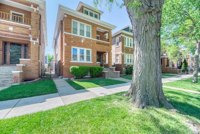 6834 S Rockwell St, Chicago, IL 60629 - view of front of home with a gate, a front yard, and brick siding