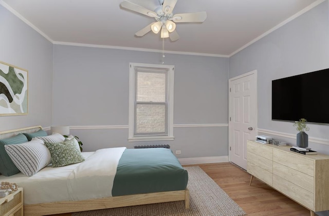 6834 S Rockwell St, Chicago, IL 60629 - bedroom with light wood finished floors, crown molding, and a ceiling fan