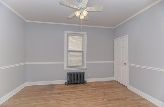 6834 S Rockwell St, Chicago, IL 60629 - spare room featuring radiator heating unit, light wood-style flooring, a ceiling fan, baseboards, and crown molding