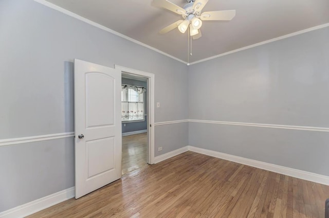 6834 S Rockwell St, Chicago, IL 60629 - empty room featuring ceiling fan, baseboards, ornamental molding, and light wood-type flooring
