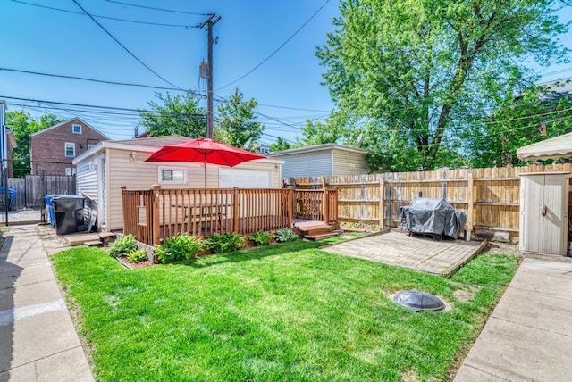 6834 S Rockwell St, Chicago, IL 60629 - view of yard featuring a wooden deck, an outdoor structure, and a garage