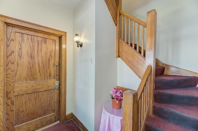 6834 S Rockwell St, Chicago, IL 60629 - carpeted entrance foyer with stairs and baseboards