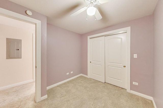 4440 N Dover St Unit Gs, Chicago, IL 60640 - unfurnished bedroom with electric panel, light carpet, a closet, and a ceiling fan