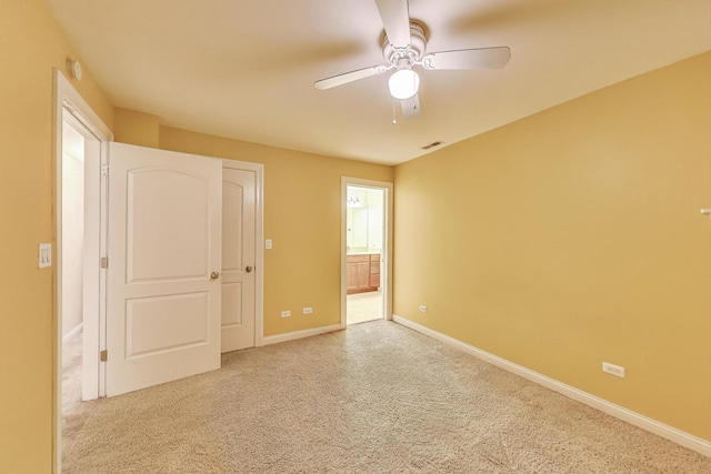 4440 N Dover St Unit Gs, Chicago, IL 60640 - unfurnished bedroom featuring carpet floors, ensuite bathroom, and ceiling fan