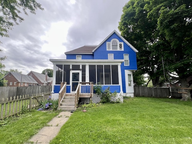 335 N Highway Ave, Deland, IL 61839 - back of property with a sunroom