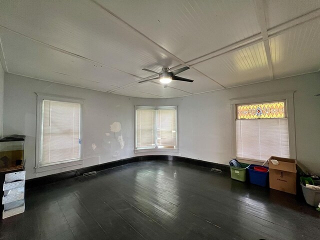 335 N Highway Ave, Deland, IL 61839 - unfurnished room featuring wood-type flooring, a ceiling fan, and baseboards