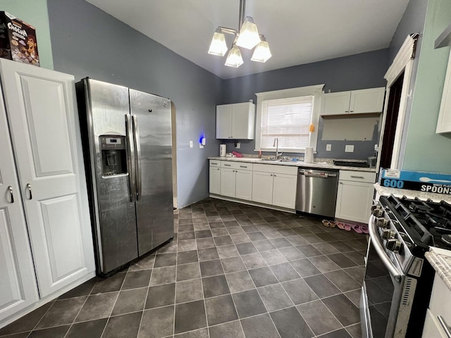 335 N Highway Ave, Deland, IL 61839 - kitchen with appliances with stainless steel finishes, white cabinetry, a sink, and dark tile patterned floors