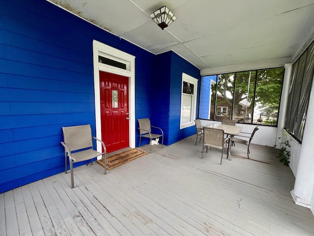 335 N Highway Ave, Deland, IL 61839 - sunroom with outdoor dining area