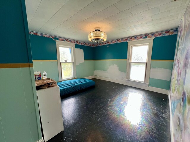 335 N Highway Ave, Deland, IL 61839 - bedroom with multiple windows and baseboards