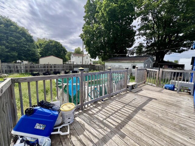 335 N Highway Ave, Deland, IL 61839 - wooden deck with a fenced backyard and an outbuilding