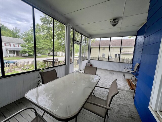 335 N Highway Ave, Deland, IL 61839 - sunroom featuring outdoor dining area