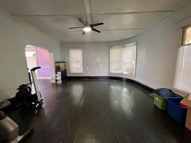 335 N Highway Ave, Deland, IL 61839 - spare room with hardwood / wood-style floors, arched walkways, ceiling fan, and plenty of natural light
