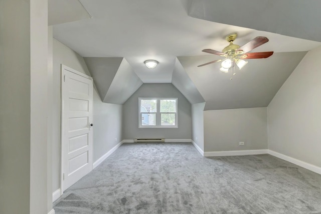 614 E 92nd Pl, Chicago, IL 60619 - bonus room featuring baseboard heating, carpet flooring, baseboards, and vaulted ceiling