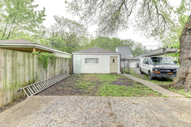 614 E 92nd Pl, Chicago, IL 60619 - back of property with an outbuilding