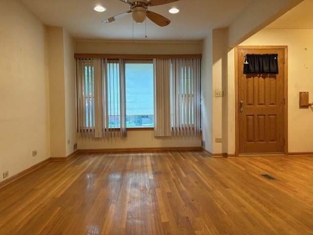 8834 S E End Ave, Chicago, IL 60617 - empty room featuring a ceiling fan, wood finished floors, baseboards, and recessed lighting